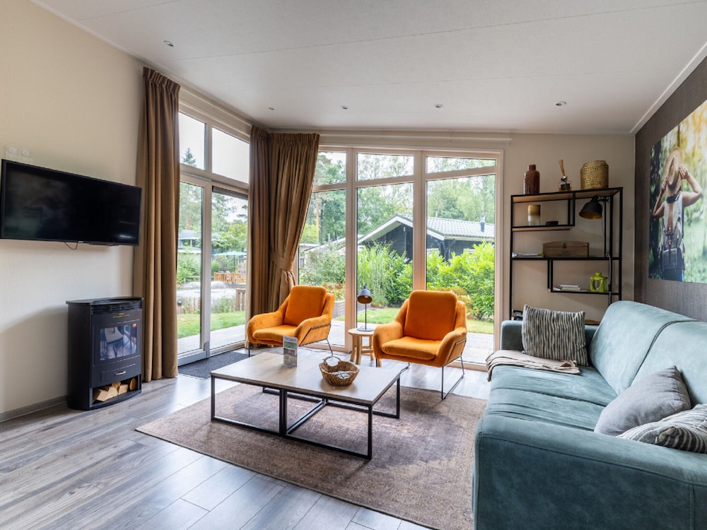 Beautiful Chalet With a Fireplace in a Wooded Area view 5