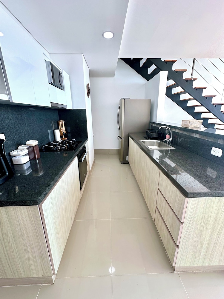 by Calamari Homes - Edificio Murano Elite