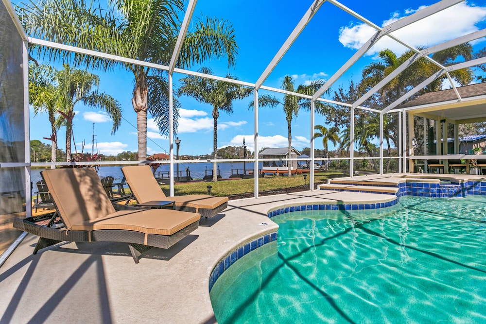 Luxe Waterfront Hideaway w Pool & Pirate Ship Dock