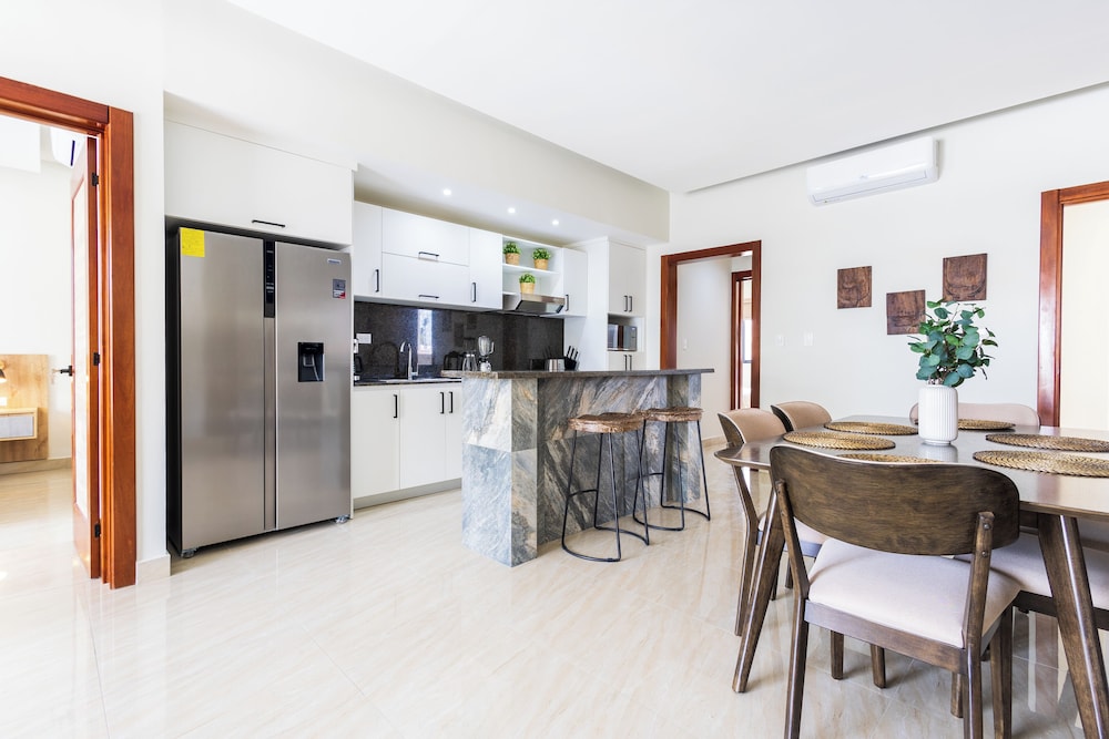 Tropical 2BR Retreat - Terrace, BBQ and Pool