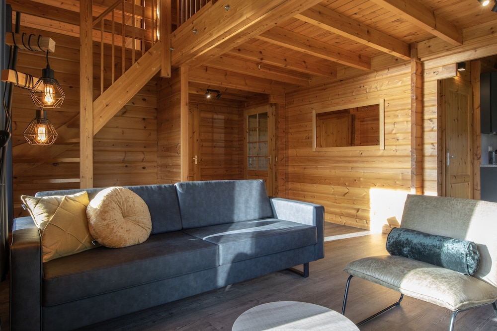 Restyled Wooden Lodge Near the Maasduinen
