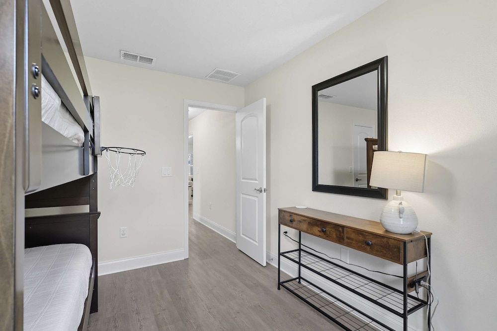 Modern 4BR Retreat Near Beach Heated Pool