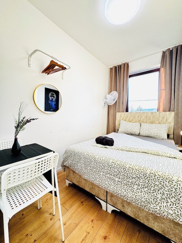 Central 8BR Stay with Garden and Terrace