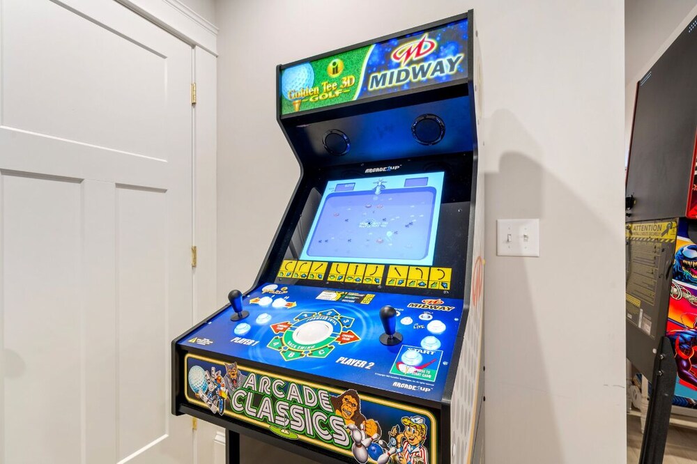 Golf-front Personal Arcade Hot tub Outdoor Kitchen