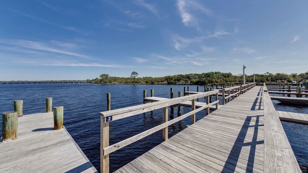 Beachfront Charm Meets Lake Life + Free Tickets: Dolphin Cruise & More!