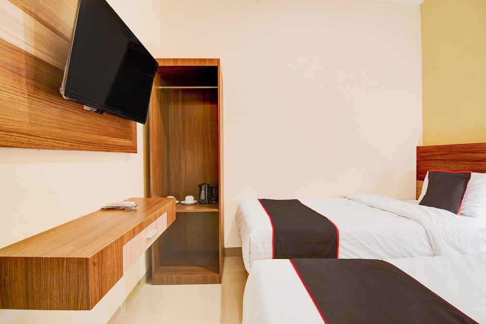 Capital O Pusat Kota Pekanbaru Near Mall Living World Formerly Radja Homestay