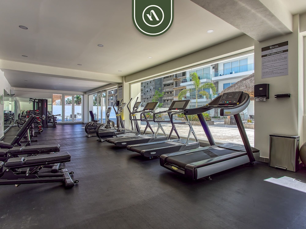 New 2 BR Condo One Street From Beach - Pool - Gym