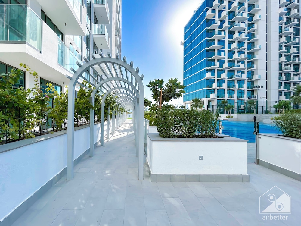 Cozy 1BR With Balcony & Views in Azizi Fawad