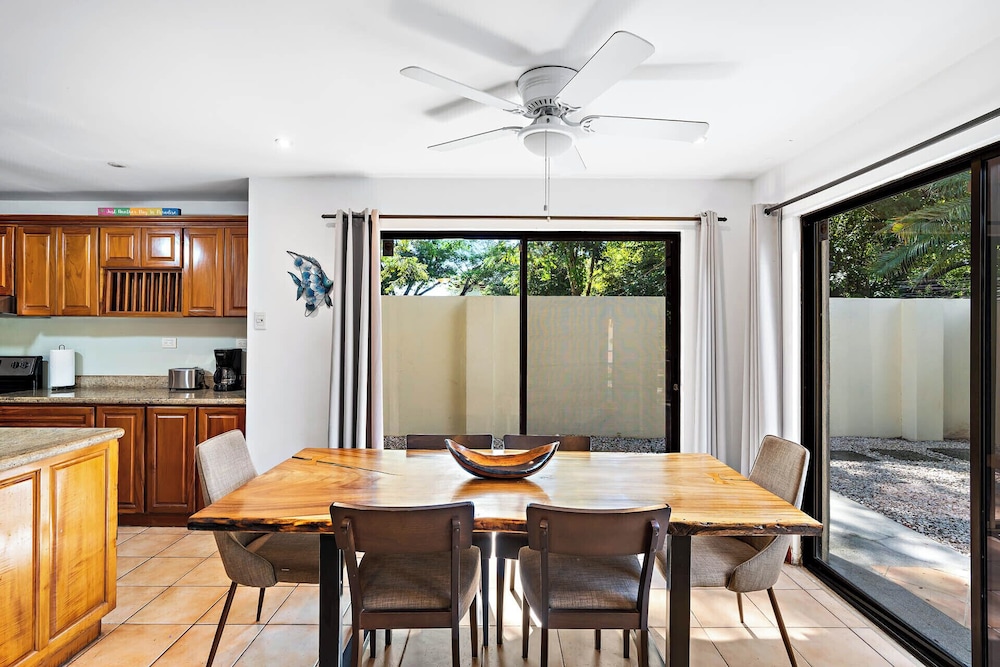 Inviting Home with Colorful Decor and Private Backyard Oasis with a Swimming Pool & Shaded Terrace