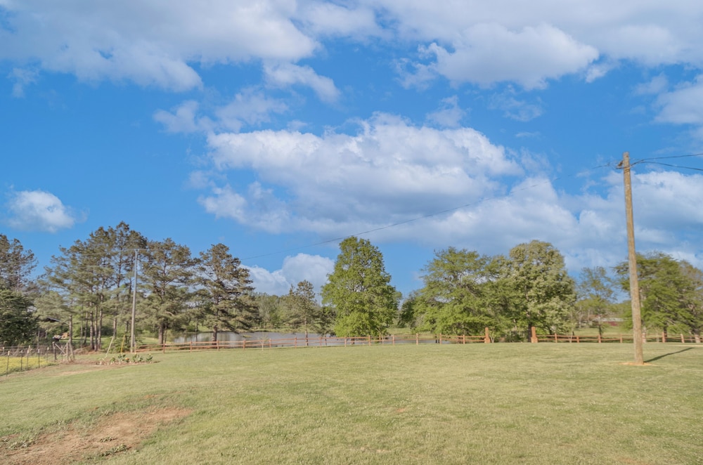 4-acre Plot: Farmhouse-chic Retreat in Forest!