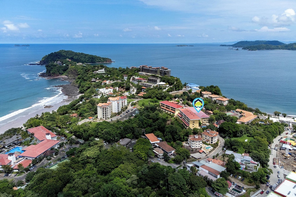 Remodeled Top-Floor Condo with Stunning Wrap-Around Balcony Offering Mountain, Ocean & Marina Views