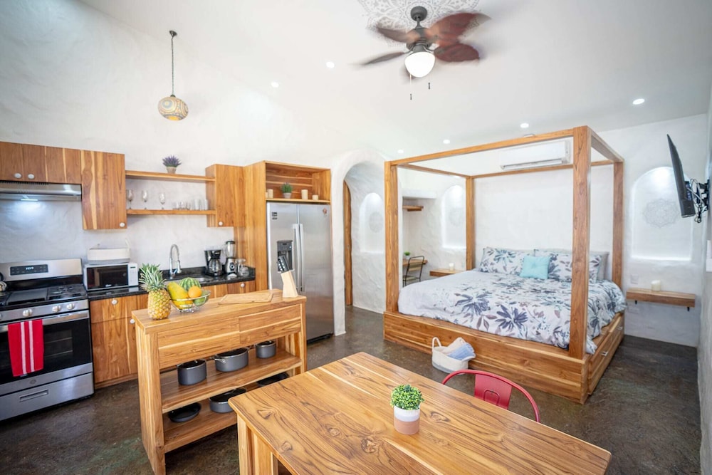 Bohemian Tropical Villa with a Tiki-Style Swimming Pool & Swim-Up Bar with an Attached Studio Apartment