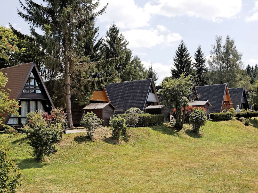Wooden Chalet With Terrace Near a Swimming Lake
