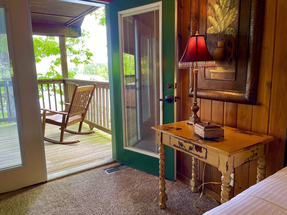 Lake view three bedroom, three bath log-sided cottage with private hot tub overlooking Lake Ouachita. by RedAwning view 2