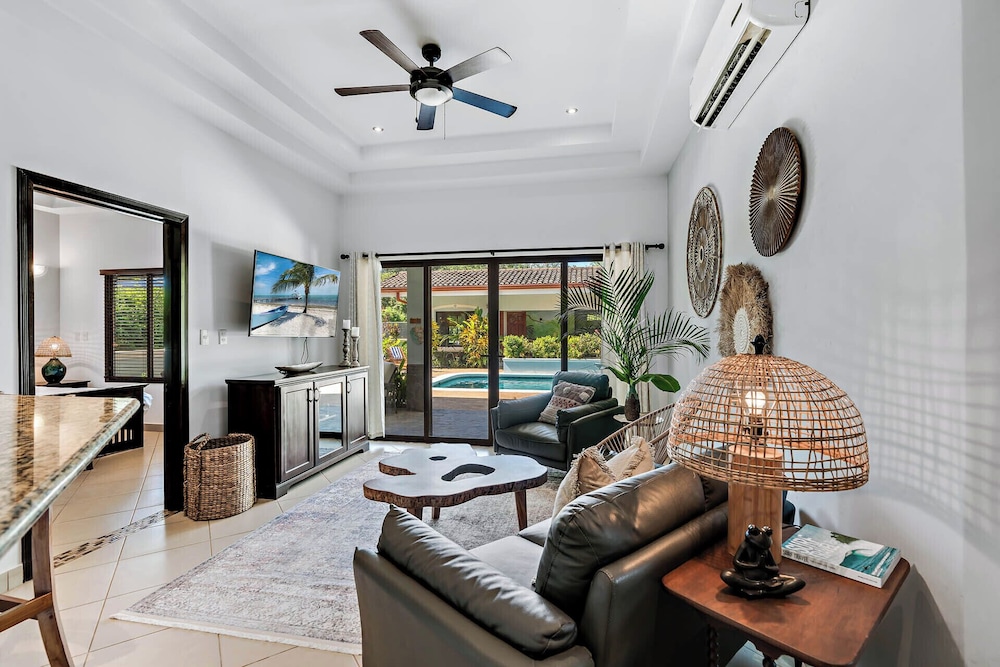 Stylish Home with Chic Decor, Luxury Amenities & Tropical Outdoor Oasis with Sparkling Private Pool