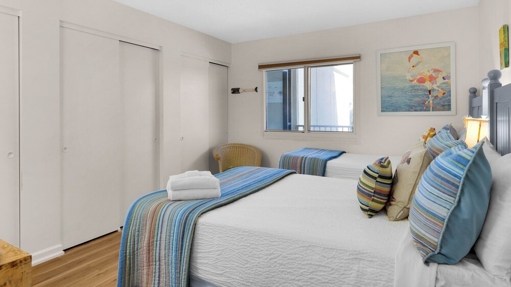 Beachfront Charm Meets Lake Life + Free Tickets: Dolphin Cruise & More!