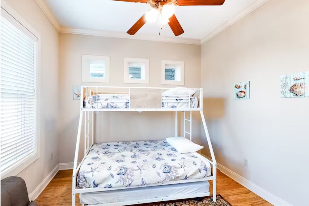 Serenity by the Sea! 4BR Retreat, Sleeps 12, Walk to Beach & Community Pool