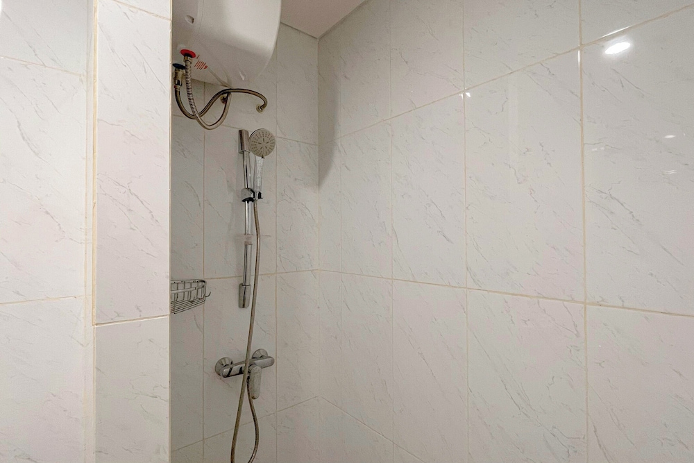 Grey Toned 1Br Apartment Tamansari Skylounge Makassar