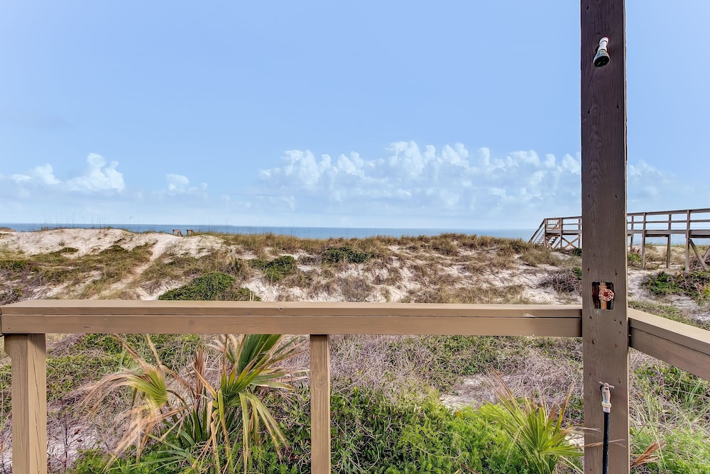Roomy Chalet-Style Beachfront Condo with Private Beach Access by RedAwning
