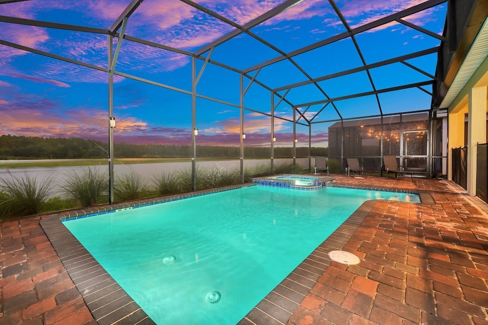 Serenity Lakeview Retreat Stunning Water Views, No Rear Neighbors, Private Pool, Game Room & Star Wars Cinema