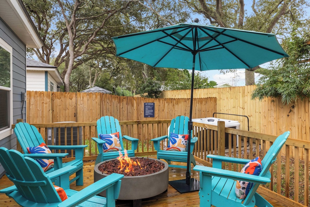 Playfully Designed Home + Hot Tub, Fire Pit & Game Room Blue Hour by Avantstay