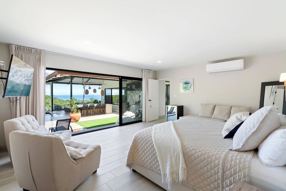 Luxe Tropical Villa with Sparkling Infinity Pool, Panoramic Ocean Views & Community Amenities