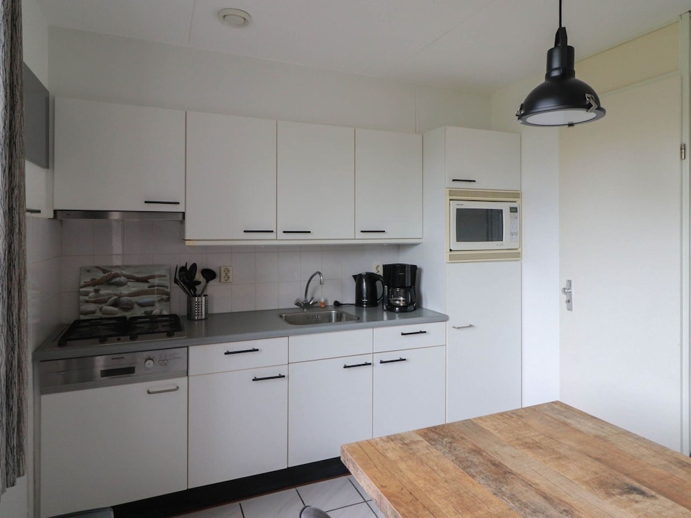 Nice Holiday Home on the Water in Friesland