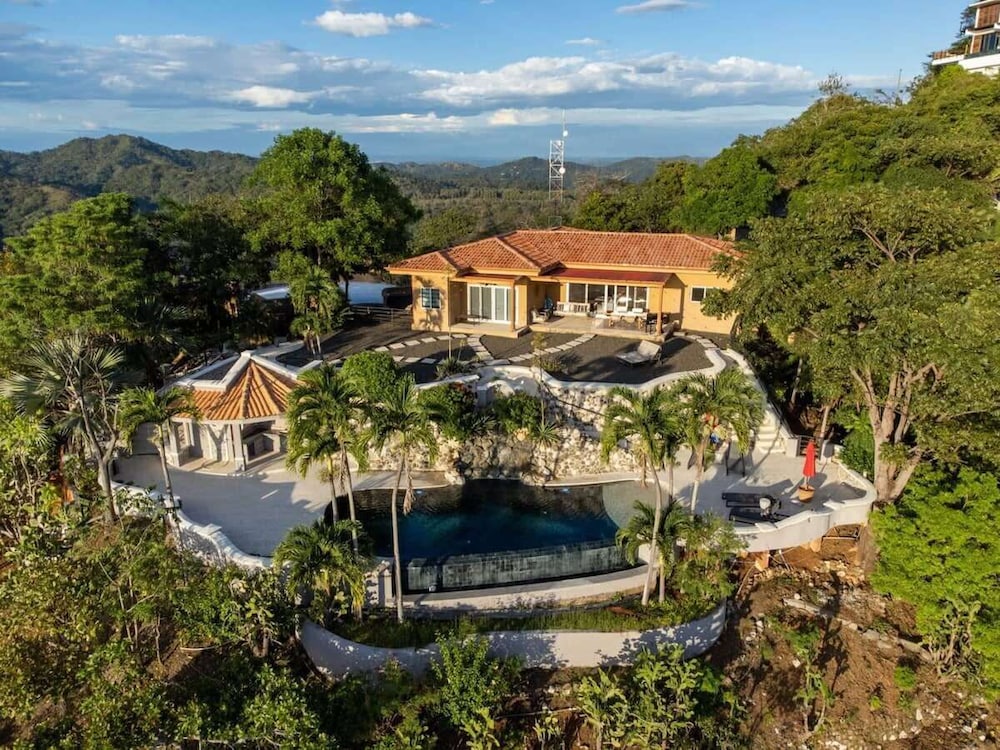 Stunning Mountaintop Property with Stylish Main Home, Private Guesthouse & Infinity Pool