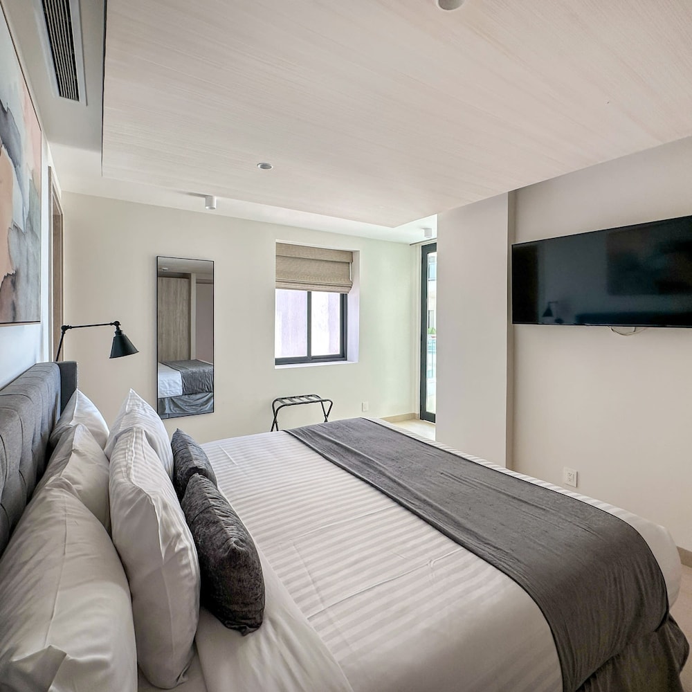 Brand-new Modern 2BR Gem on Iconic Sandy Beach