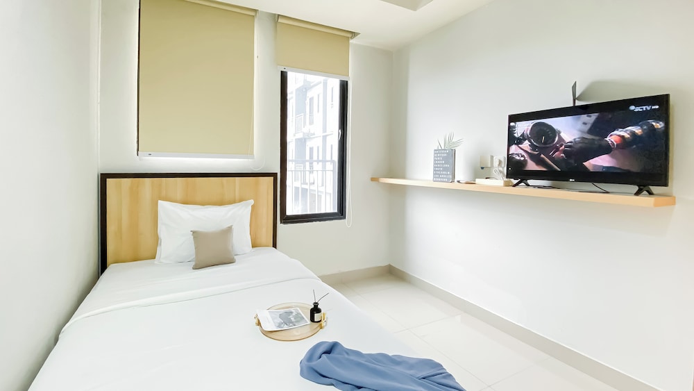 Nice And Comfy Studio At Evenciio Margonda Apartment
