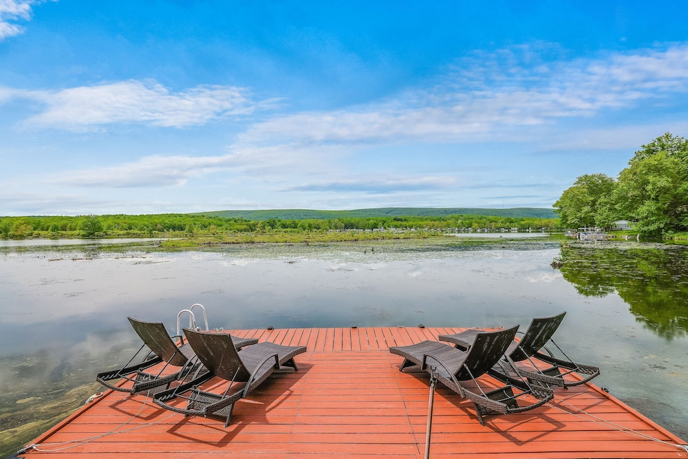 Lakefront A-frame Dock Kayaks Fire Place