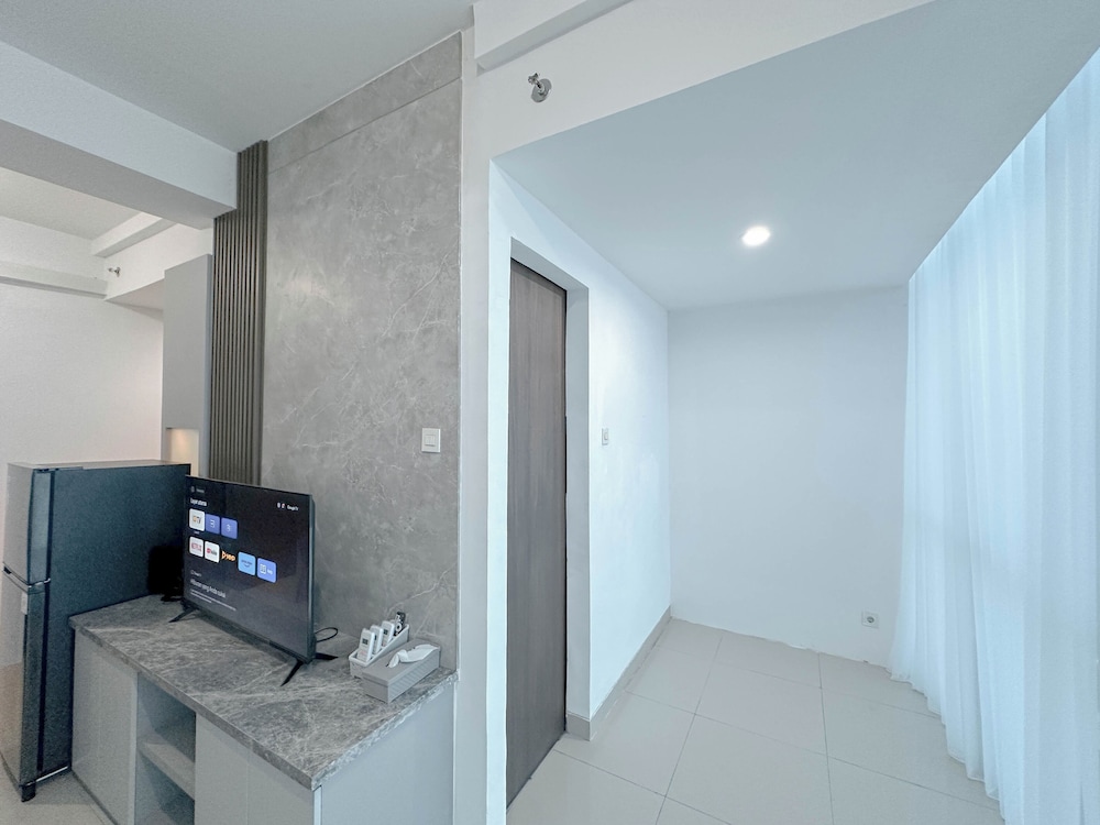 Combined Grey Toned 2Br Apartment At The City Square Surabaya