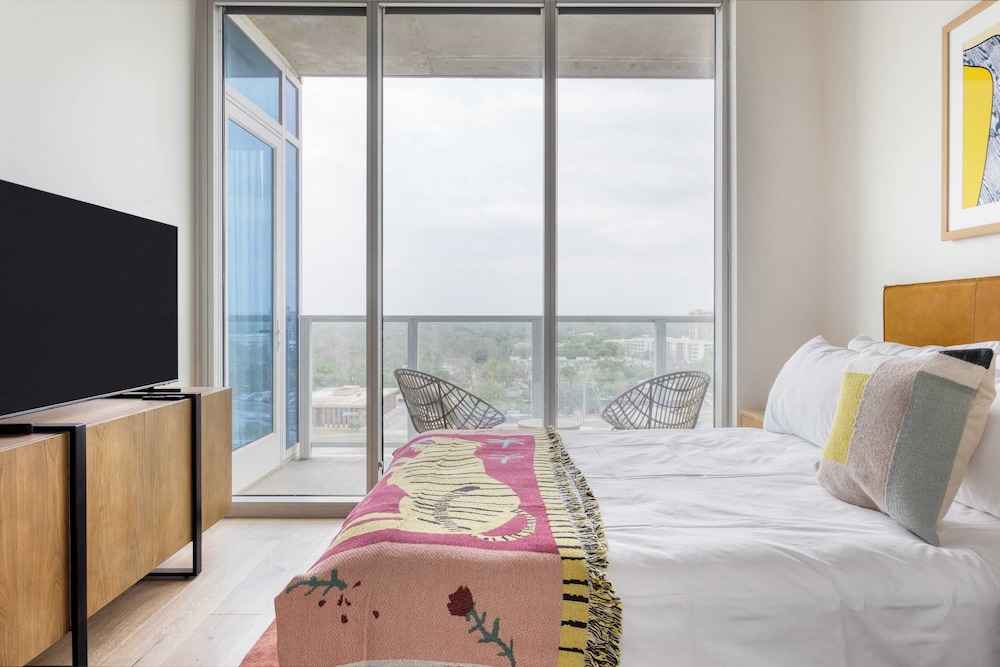 Sleeps 34! 11 Condos in New Austin High Rise w/ Rooftop Pool, Gym, Yoga Studio