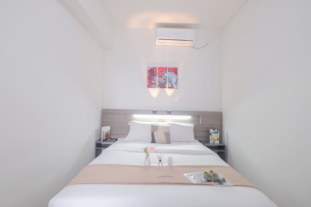 Cozy and Sweet 2BR Apartment at Vittoria Residence