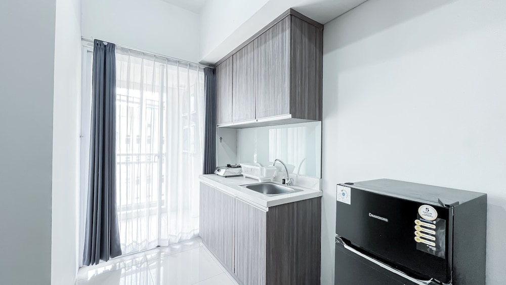 Homey 2BR Apartment with Space Room at Vittoria Residence