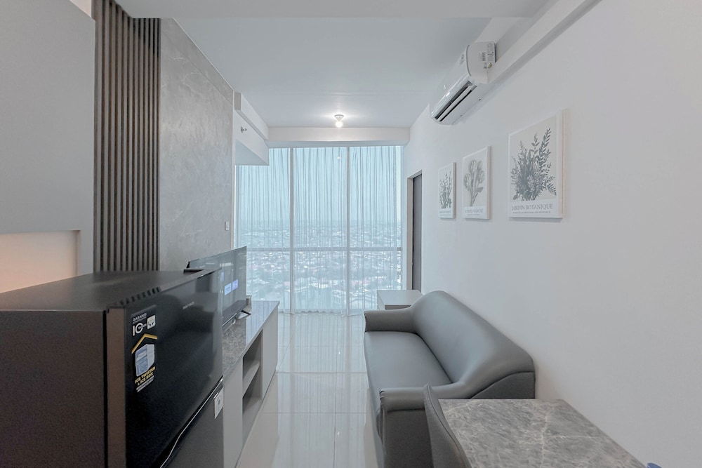 Combined Grey Toned 2Br Apartment At The City Square Surabaya