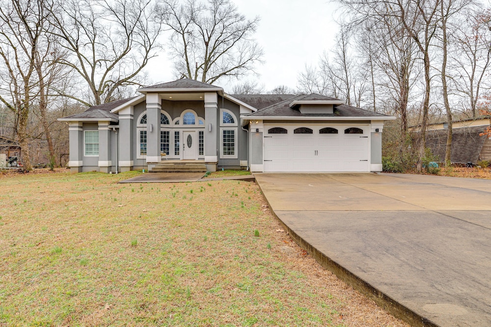 Firplace & Deck: Riverfront Heber Springs Home
