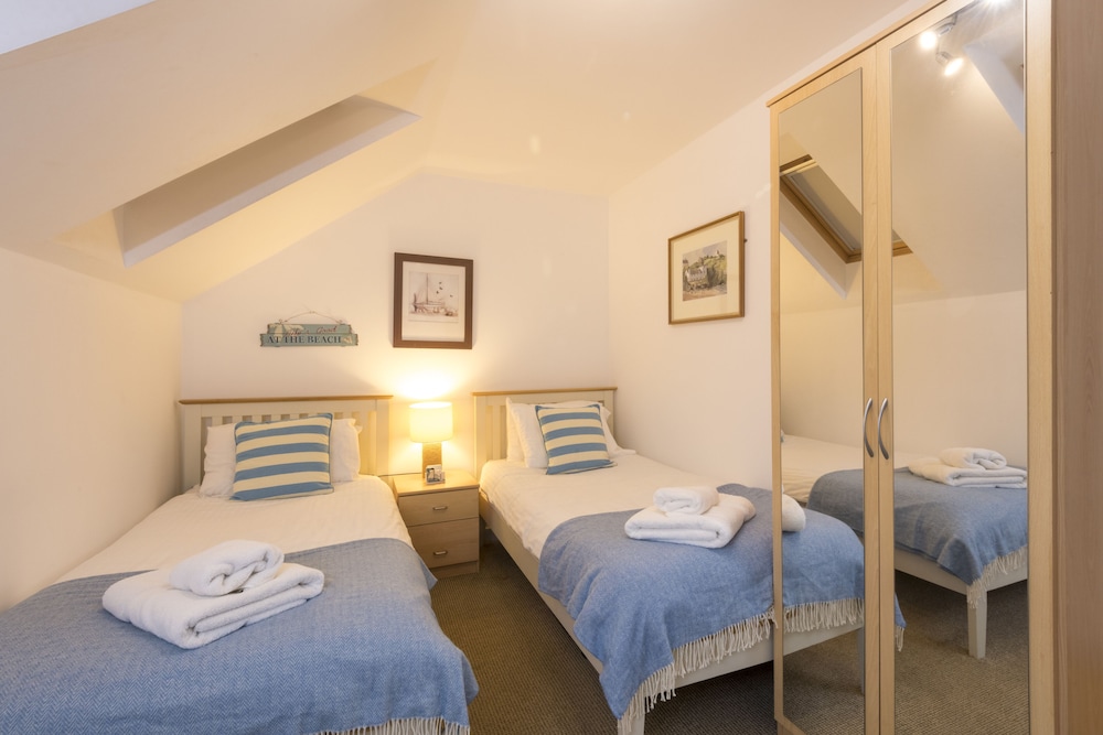 The Beach House & Porth Sands Apartments