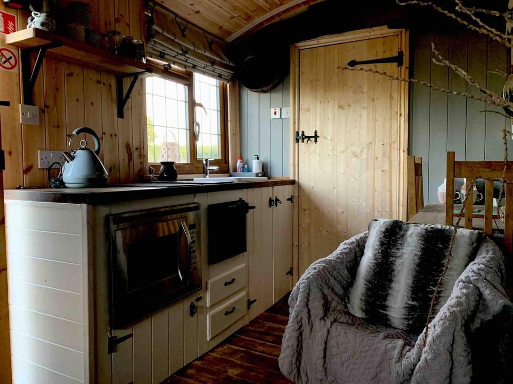 Cute and Cosy Shepard hut With Wood Fuel hot tub view 3
