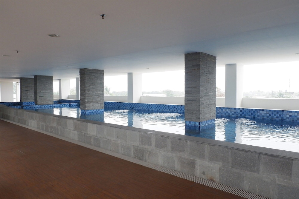 Comfortable and Warm Studio at Poris 88 Apartment
