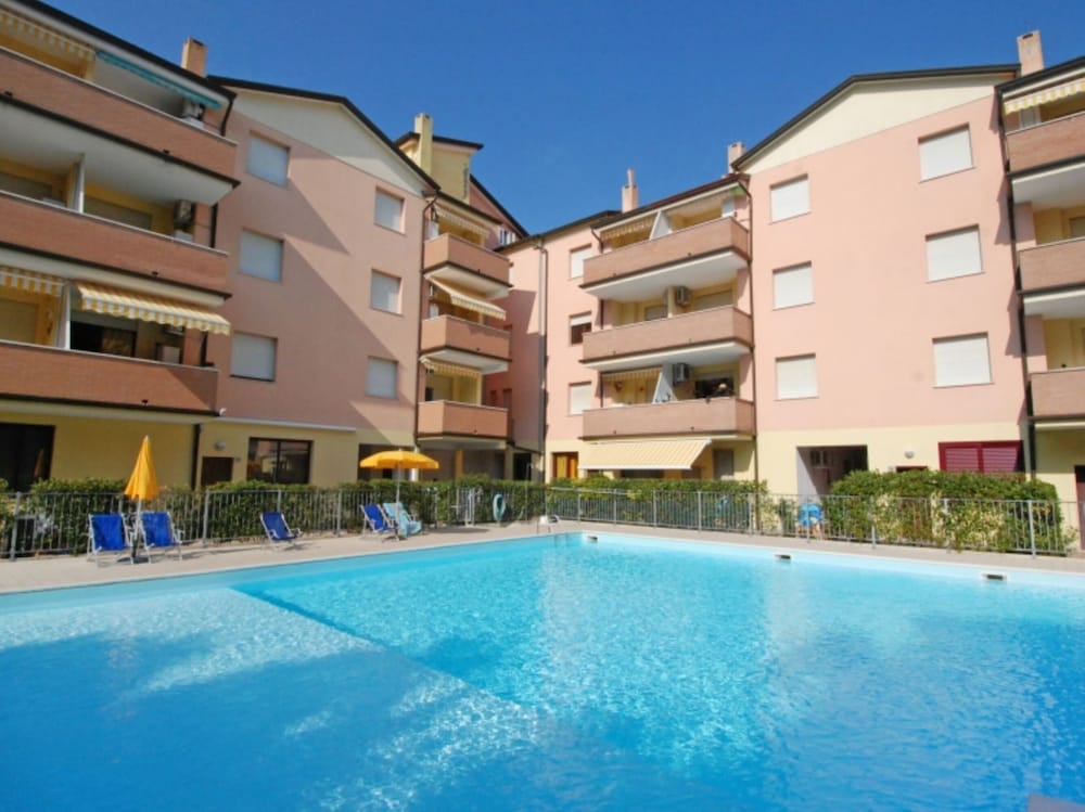 Apartment With Pool Near the Beach
