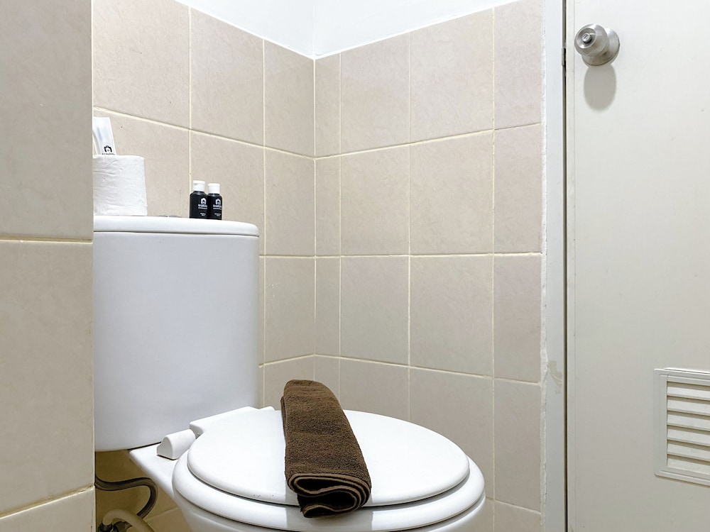 Tidy and Warm 2BR at Podomoro Golf View Apartment