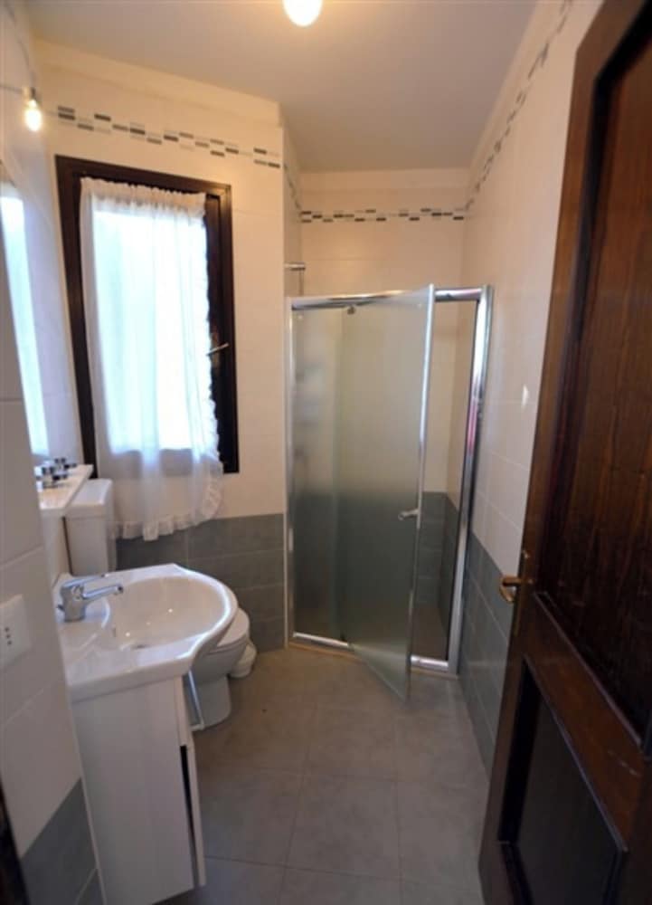 Large row House With Private Fenced Garden for 10 Guests in Lignano Pineta