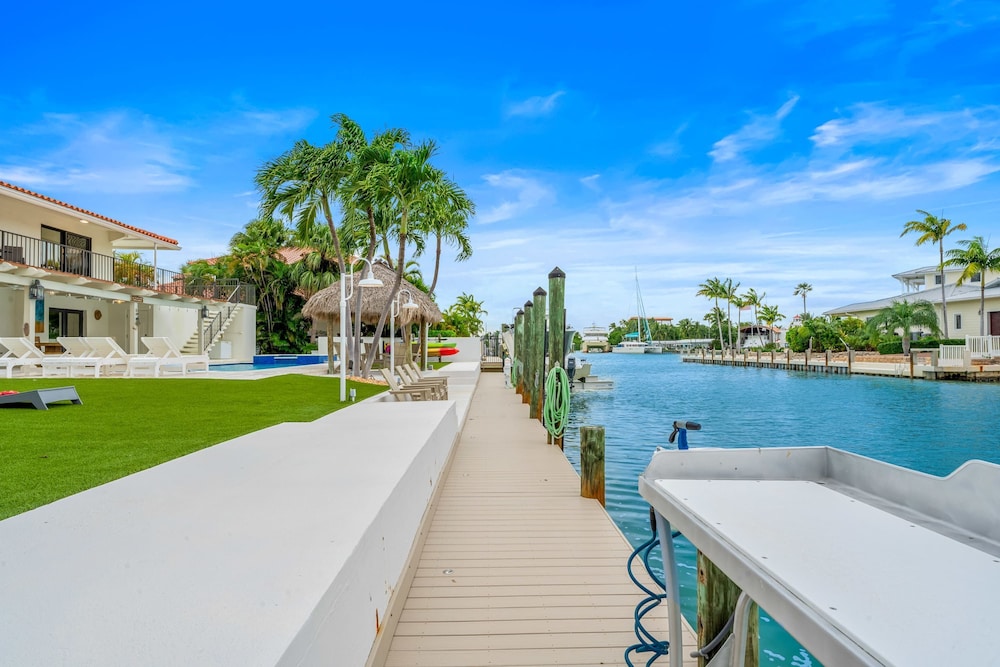 Deep Blue Waterfront Gem Pool Kayaks Dock
