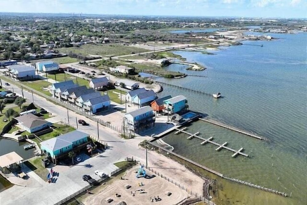 Waterfront Escape w/ Views Shared Pool & Boat Dock Orange Crush by Avantstay