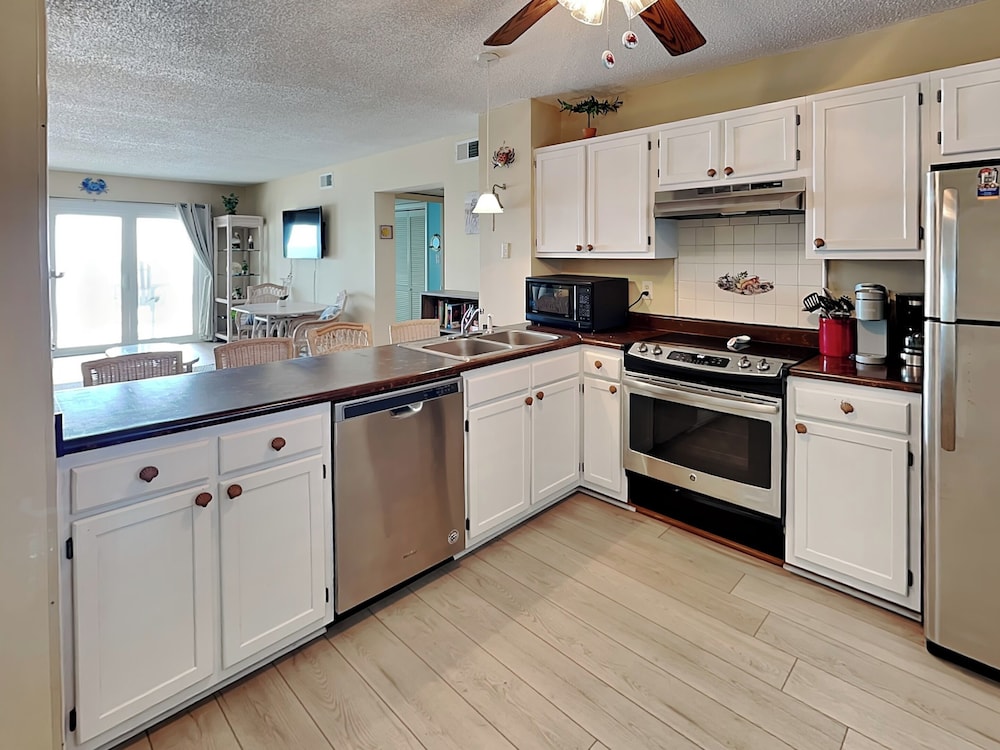 A Wave From It All by Topsail Realty