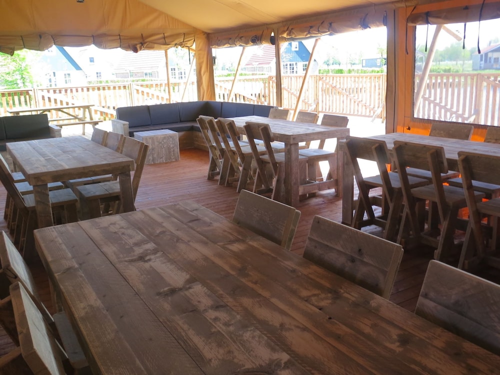 Campsite - Combined Tents With Kitchen and Bathroom Located Near a Pond