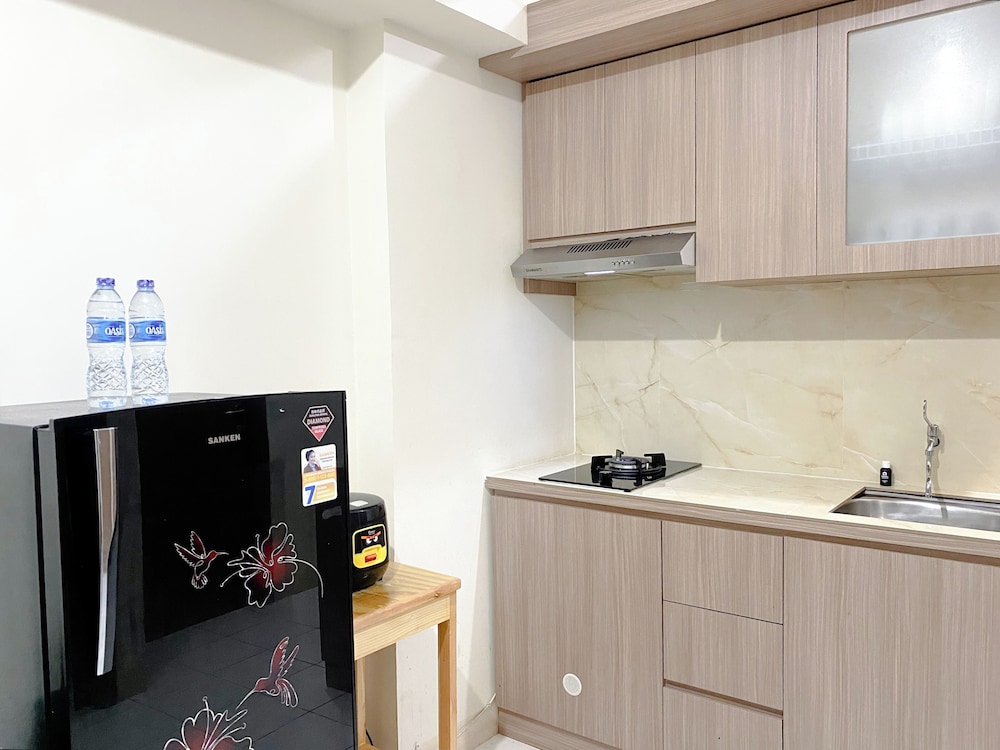 Tidy and Warm 2BR at Podomoro Golf View Apartment
