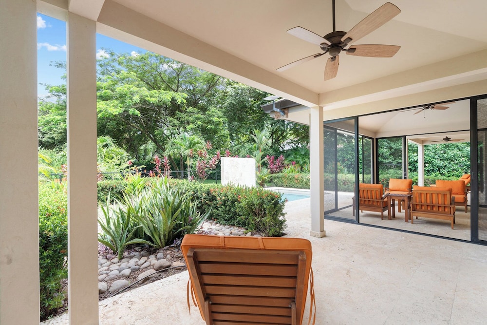 Beautiful home in a gated Neighborhood, Walking Distance to Beach with Garden