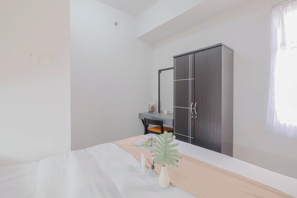 Minimalist and Well Designed 2BR Apartment with Extra Room at Vittoria Residence